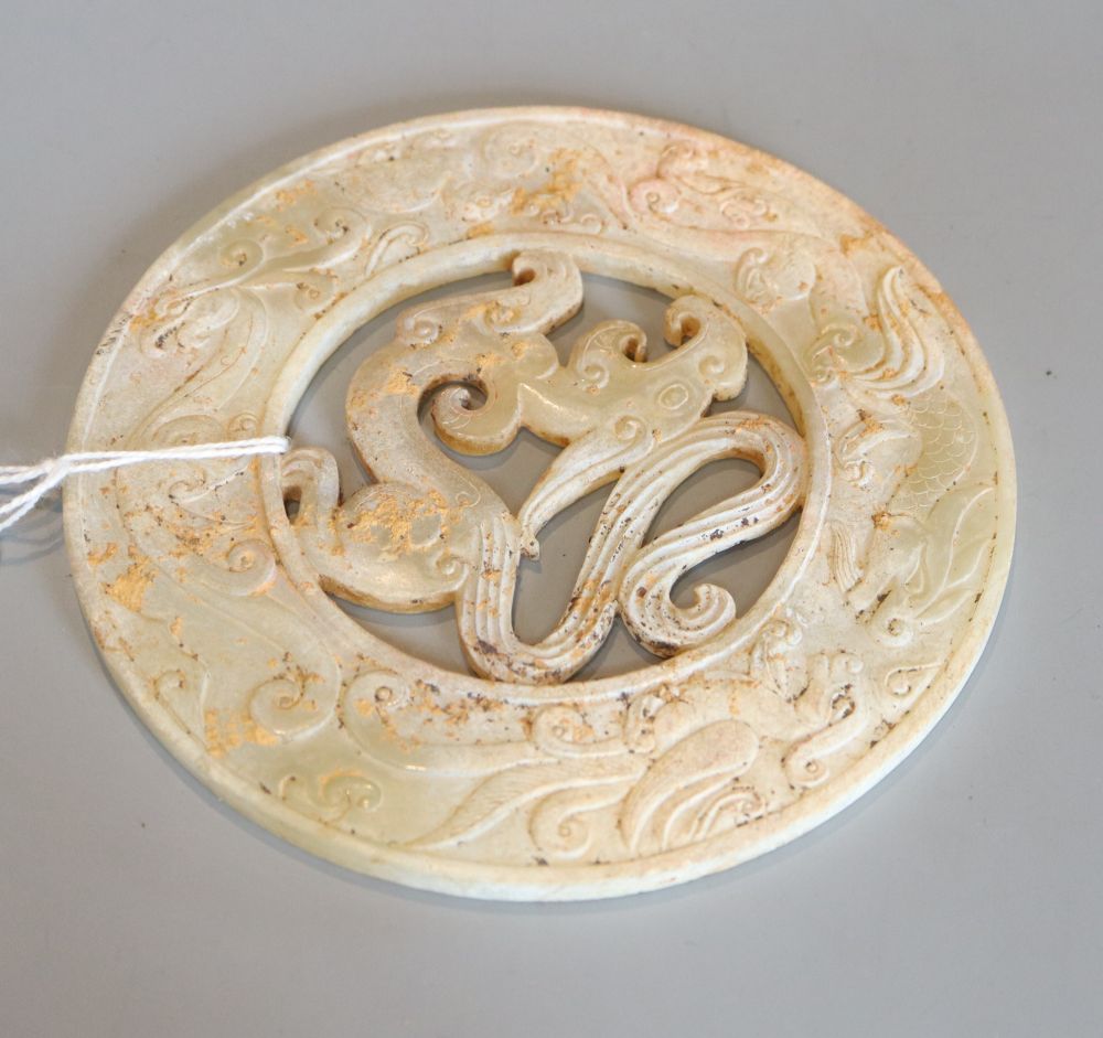 A Chinese yellow hardstone disc